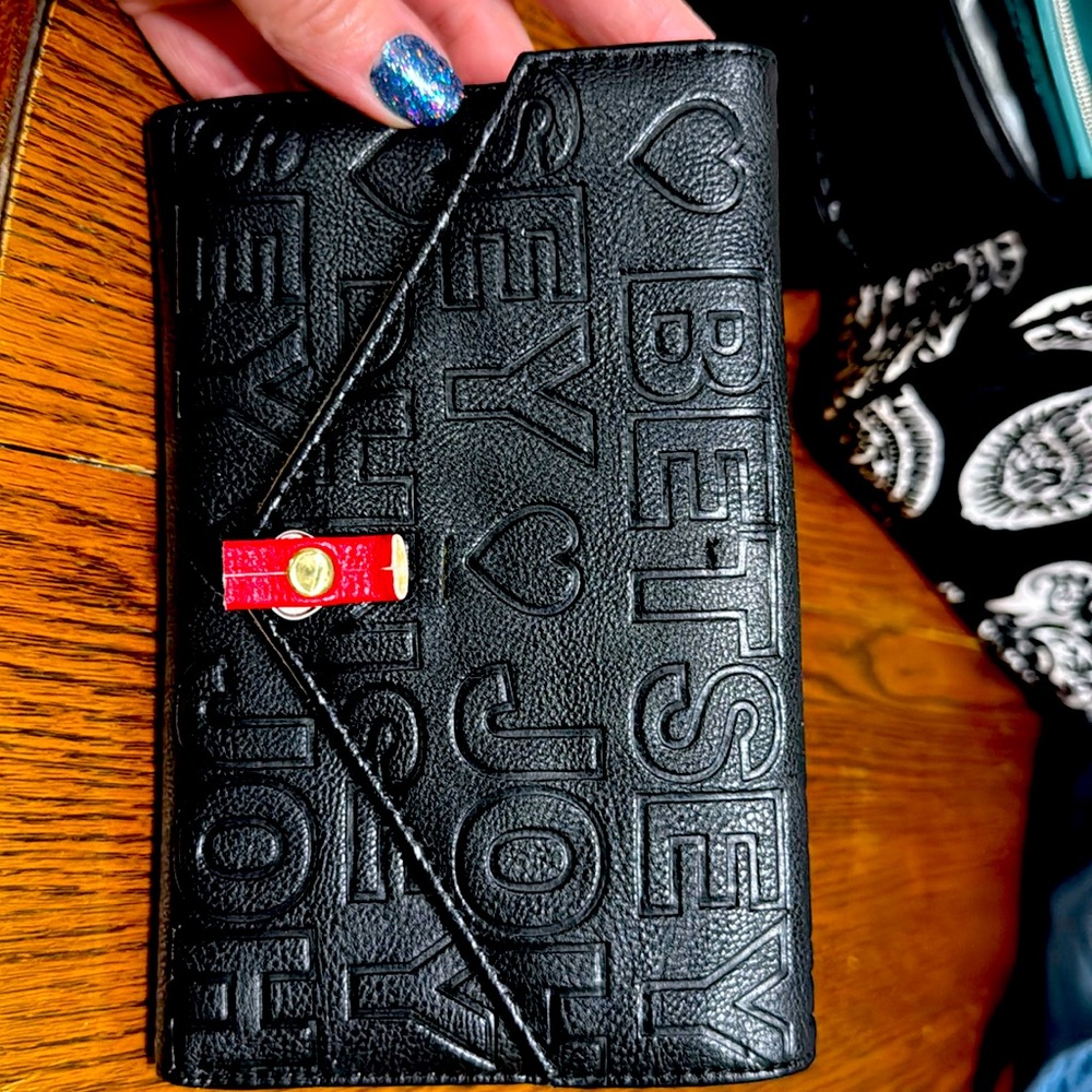 Black Vegan Leather Betsey Johnson Envelope shaped clutch wallet Gently used.